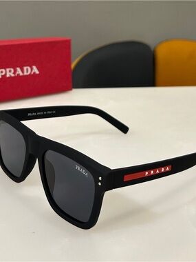 Prada Matte Black Sunglasses with Red Temple Stripe